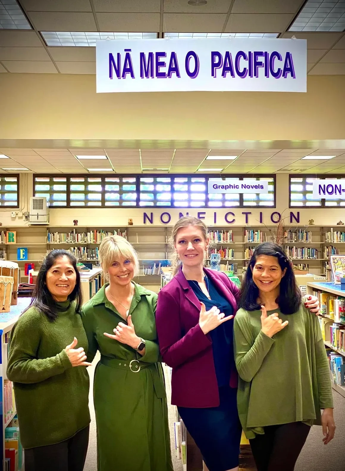 ELD leaders in Leeward, Hawaii Department of Education posing in a school library